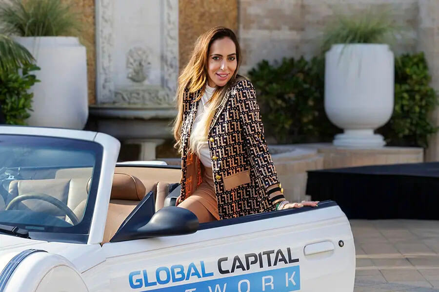Annabella with the Global Capital Network car
